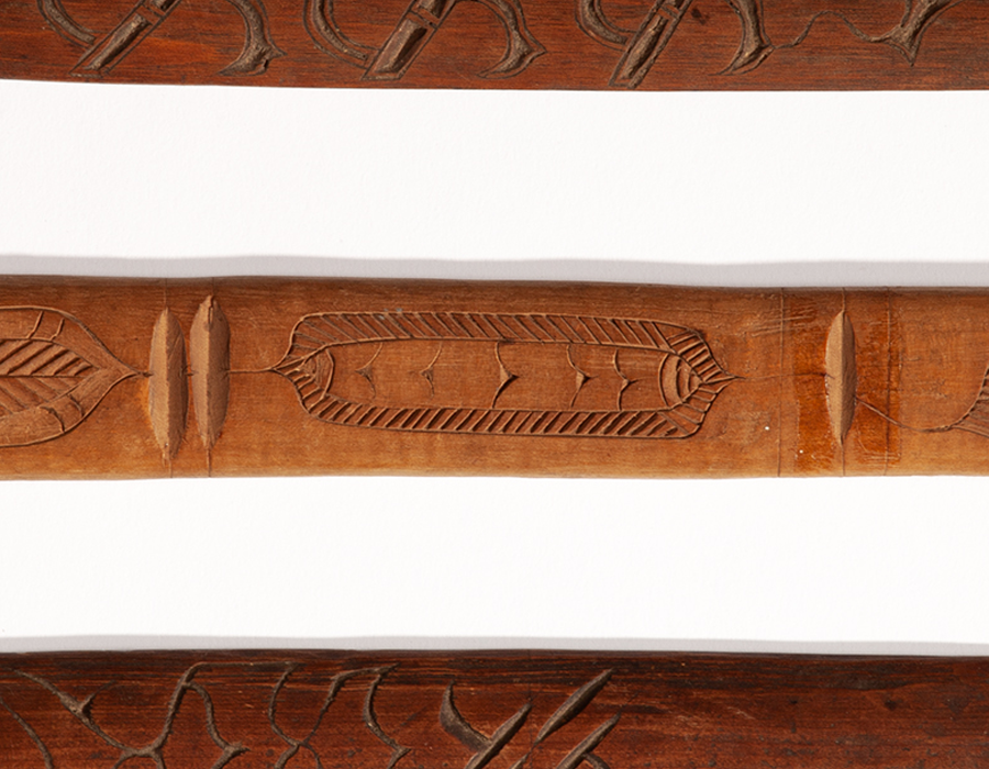 A segment of a photograph of carved ikupasuy