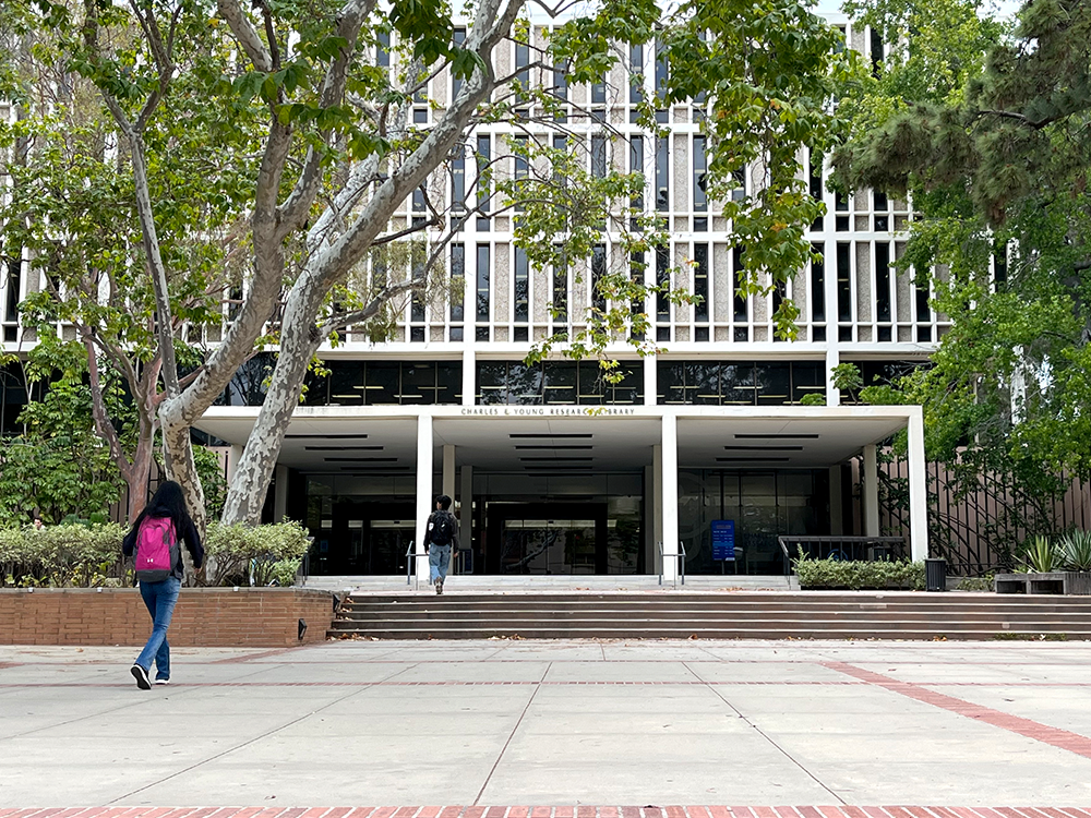 A photograph of a library building's front doors.