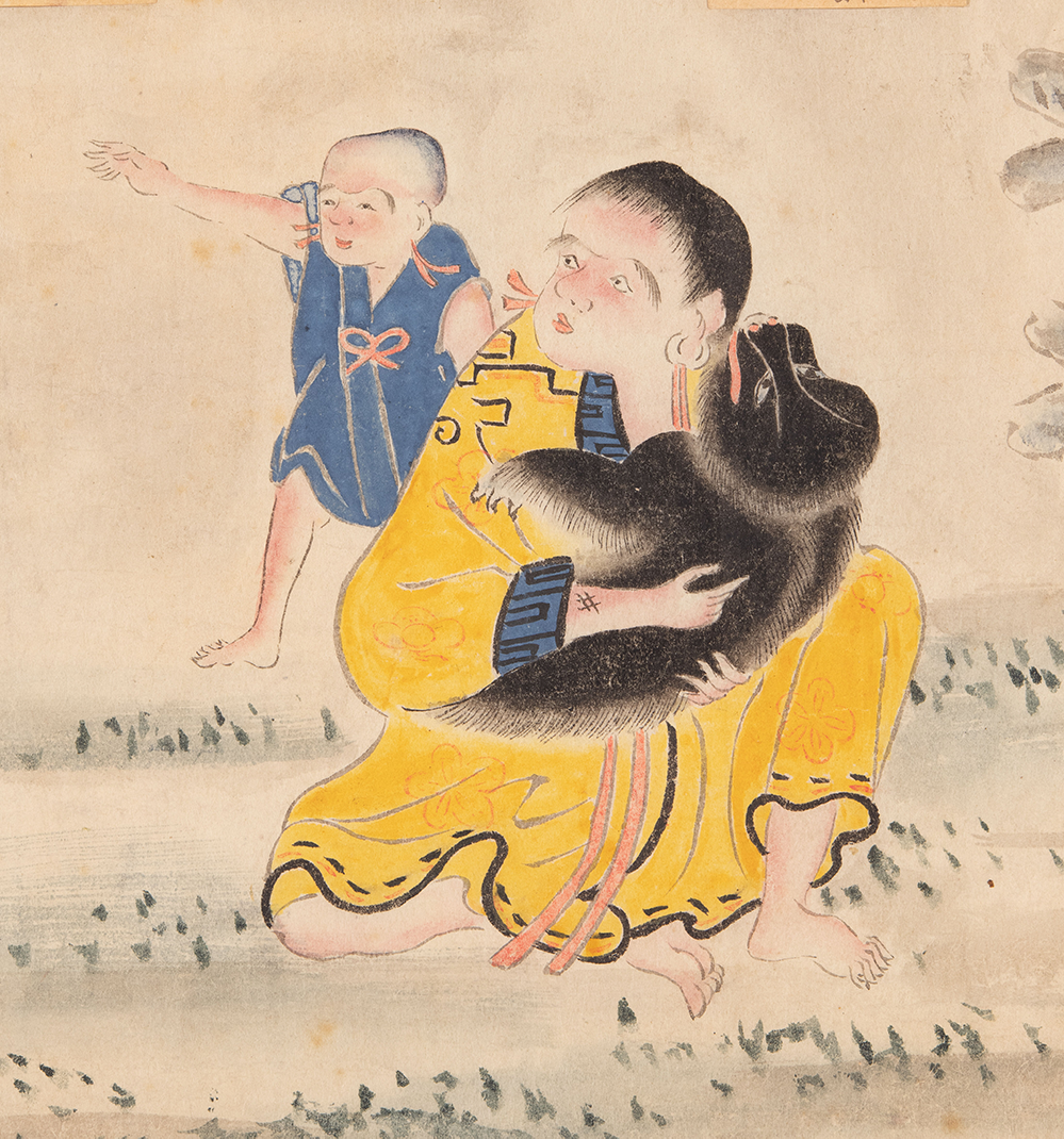 A painting of an Ainu woman wearing yellow robes sitting on the ground holding a baby bear. There is a child behind her pointing at something she is looking at.