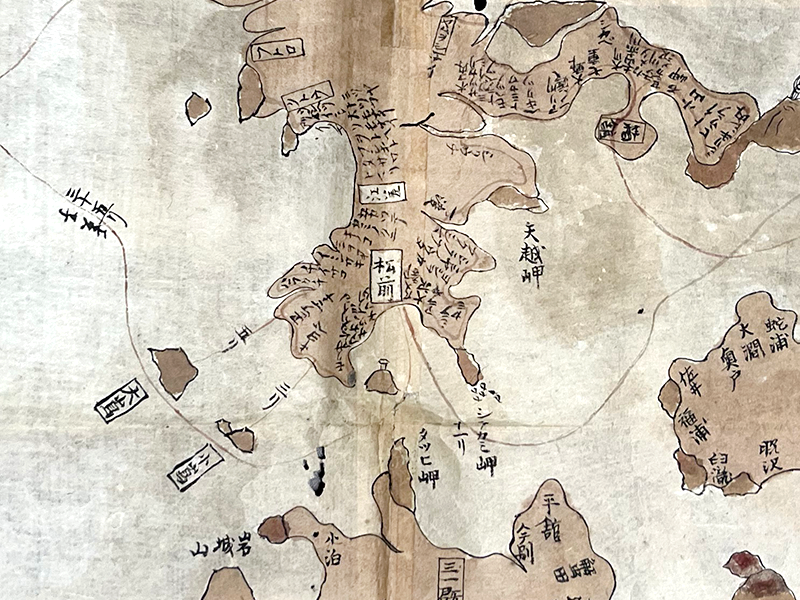 A segment of a handpainted map showing part of Hokkaido in brown wash.