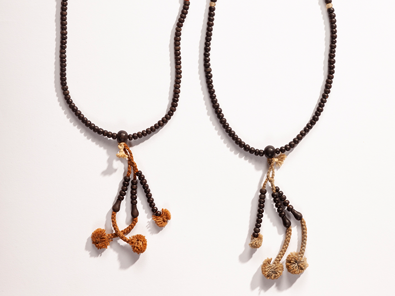 A closeup photograph of a Buddhist rosary.