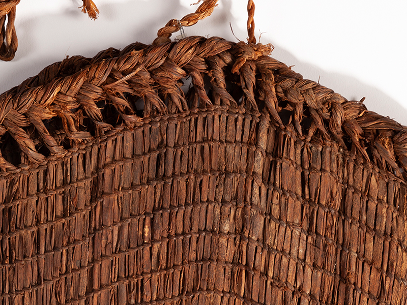 A closeup photograph of the weave of a saranip basket.